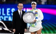 Jessica Pegula of the United States poses with the runner-up trophy after losing to <a href='https://www.sportskeeda.com/player/cori-gauff' target='_blank' rel='noopener noreferrer'>Coco Gauff</a> of the United States in the singles final on Day 9 of the <a href='https://www.sportskeeda.com/go/wuhan-open-tennis' target='_blank' rel='noopener noreferrer'>Wuhan Open</a> at Optics Valley International Tennis Center on October 12, 2025 in Wuhan, China (Photo by Robert Prange/Getty Images) - Source: Getty